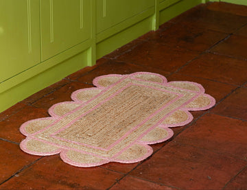 Constance and Denny's Rose scalloped jute floor mat