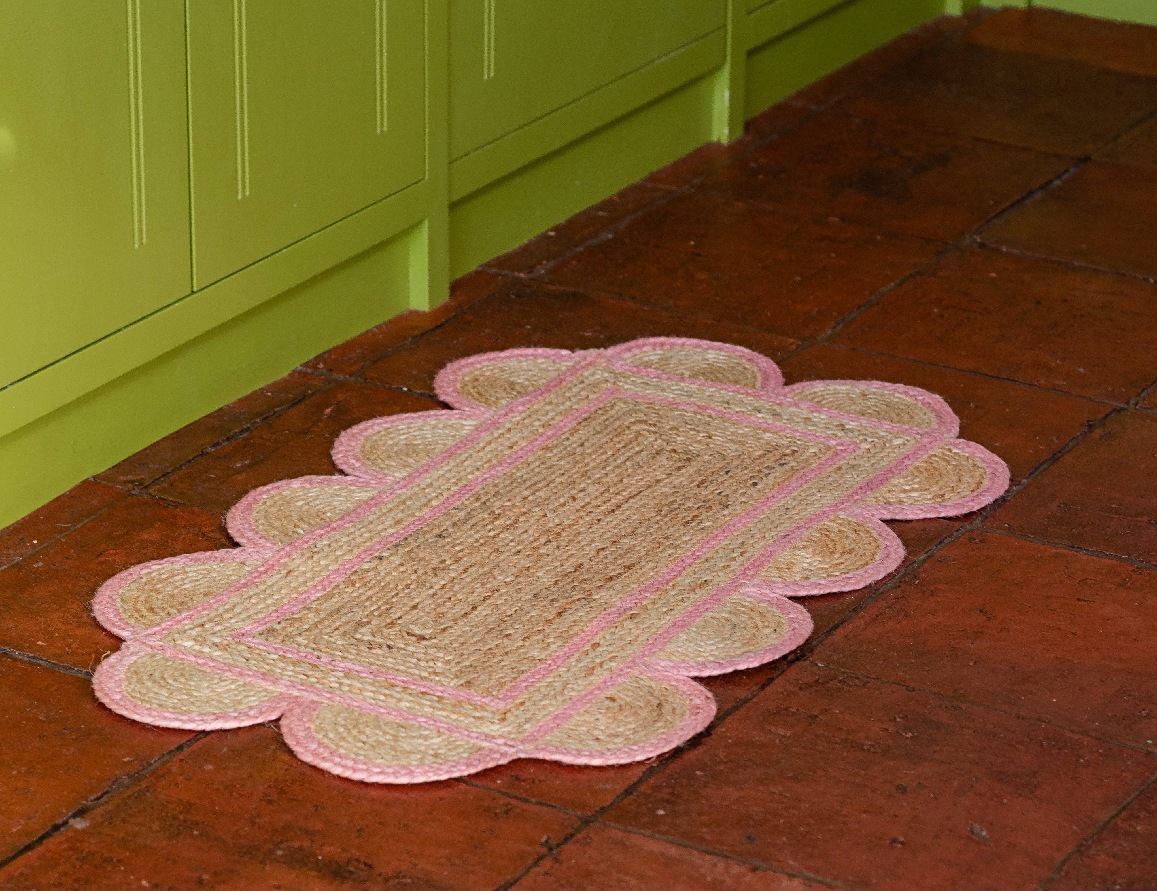 Constance and Denny's Rose scalloped jute floor mat