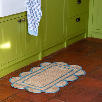 Constance and Denny's Teal scalloped jute floor mat