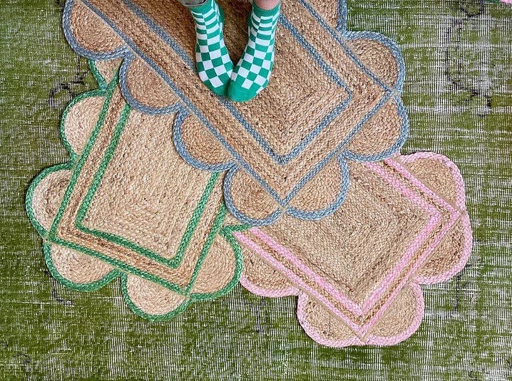 Constance and Denny's Rose scalloped jute floor mat